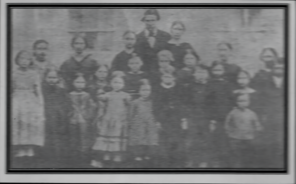 1860 one room school master with his students.